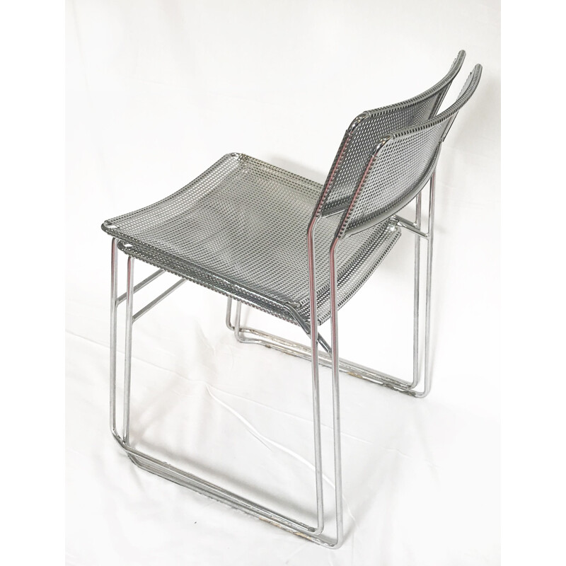 Set of 2 perforated chromed steel chairs by Niels Jorgen Haugesen for Magis