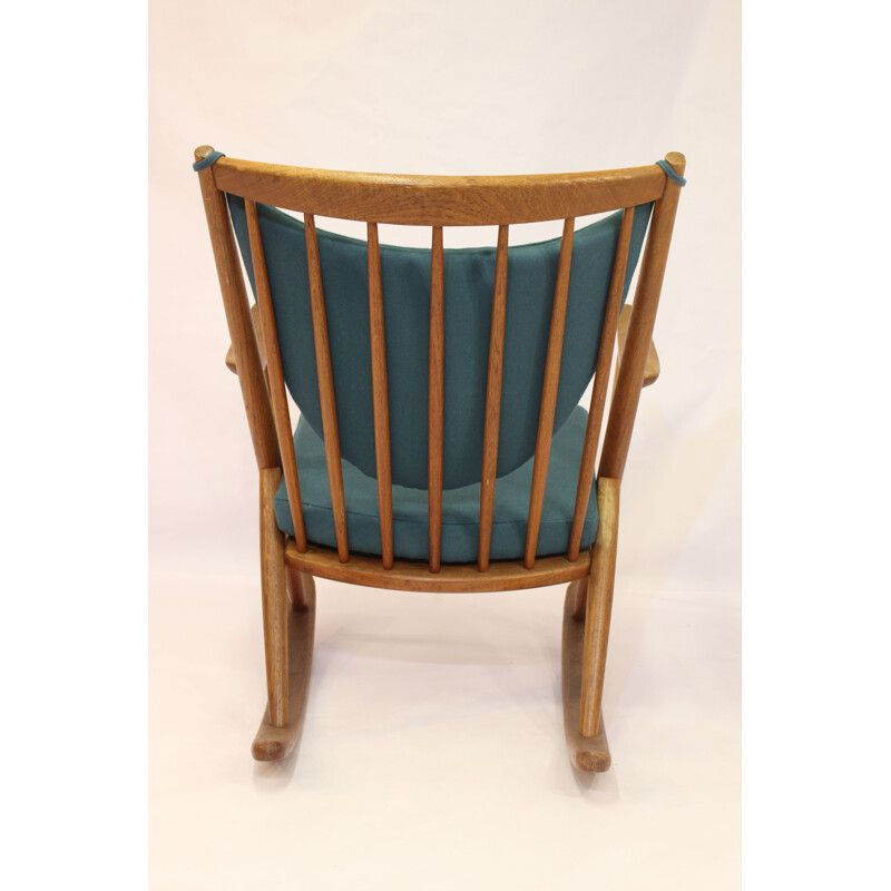 Rocking chair in teak by Frank Reenskaug