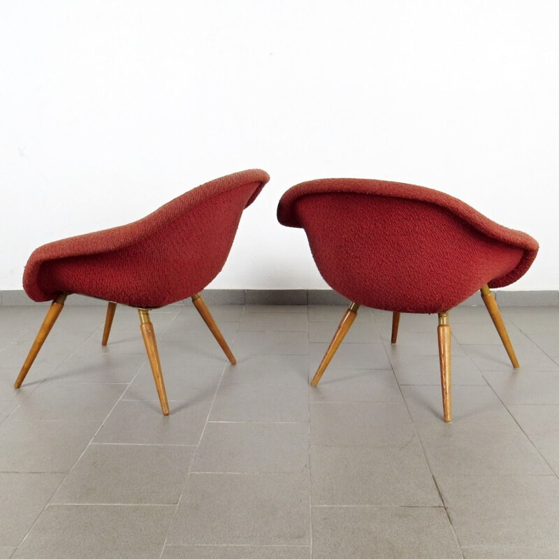 Pair of red armchairs by Frantisek Jirak