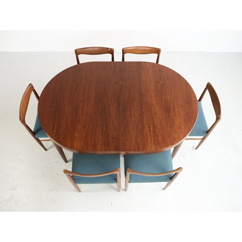 Vintage Danish round table in teak with 2 extension plates by Kai Kristiansen
