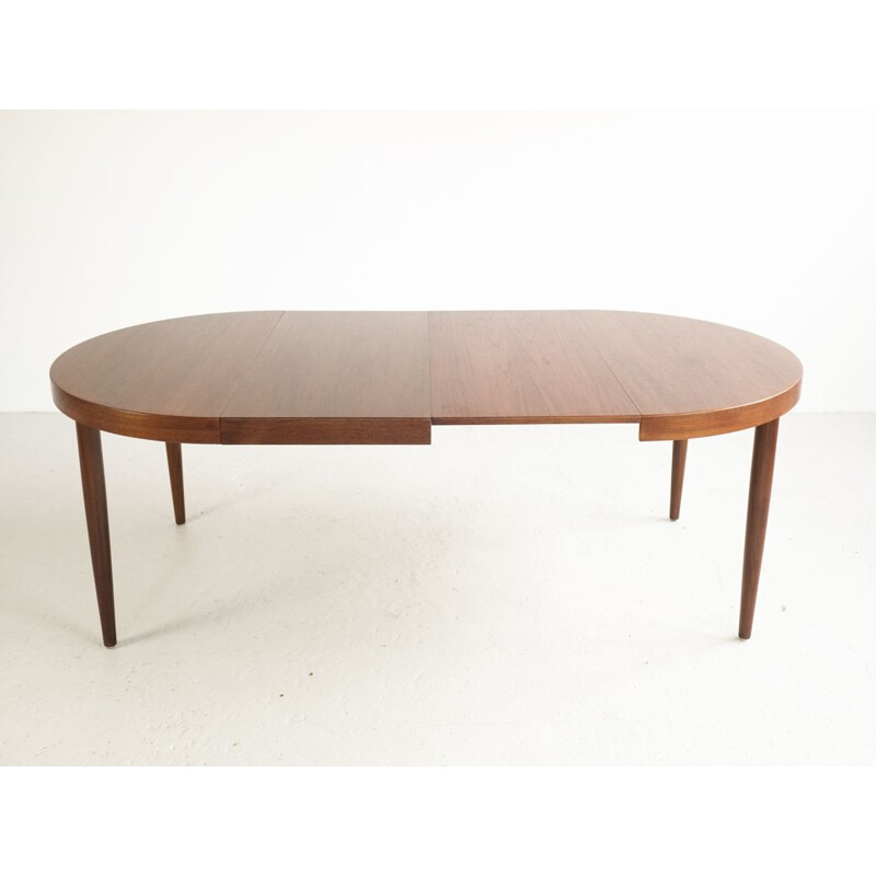 Vintage Danish round table in teak with 2 extension plates by Kai Kristiansen
