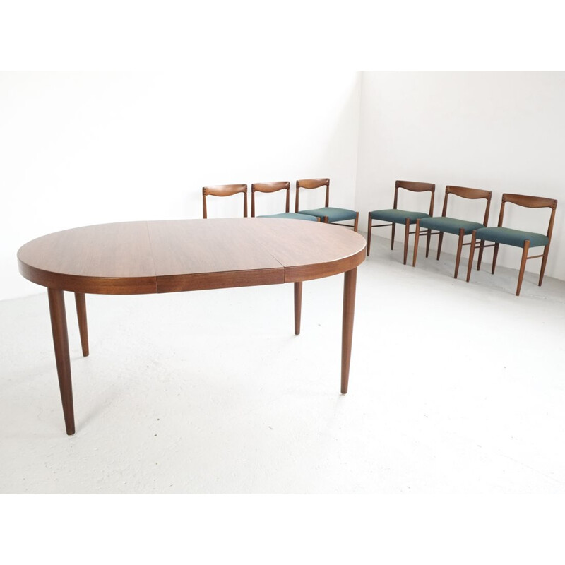 Vintage Danish round table in teak with 2 extension plates by Kai Kristiansen