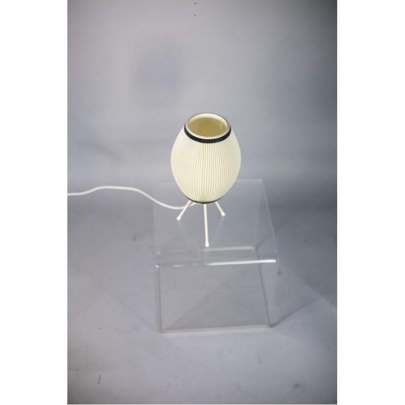 Beige tripod lamp in plastic