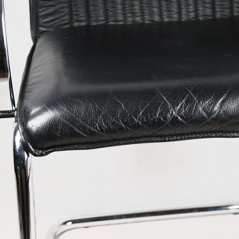 Black leather armchair by Sitland