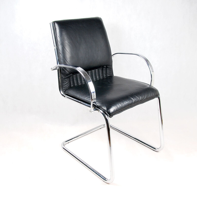 Black leather armchair by Sitland