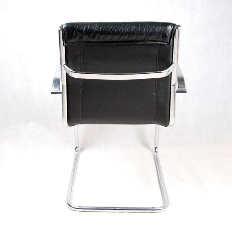 Black leather armchair by Sitland