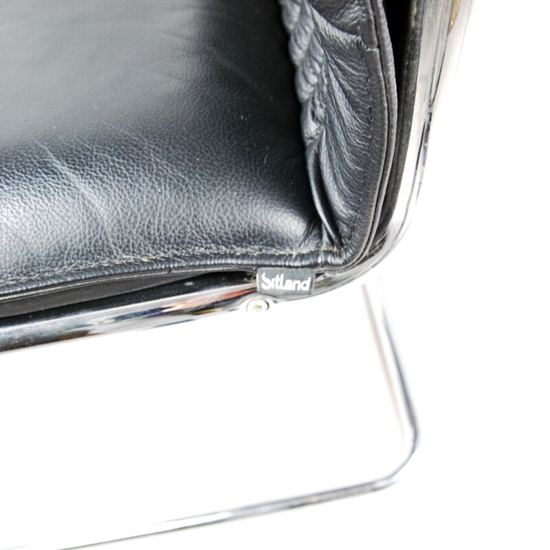 Black leather armchair by Sitland