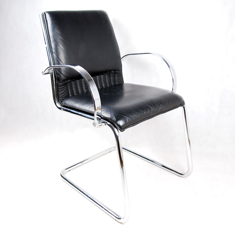 Black leather armchair by Sitland