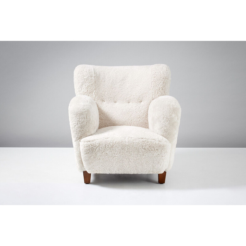 Fauteuil vintage danois en peau de mouton 1930