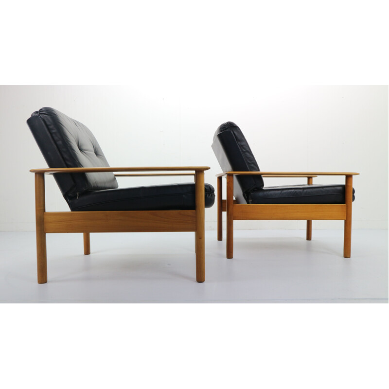 Set of 2 vintage scandinavian armchairs in black leather and beechwood 1960