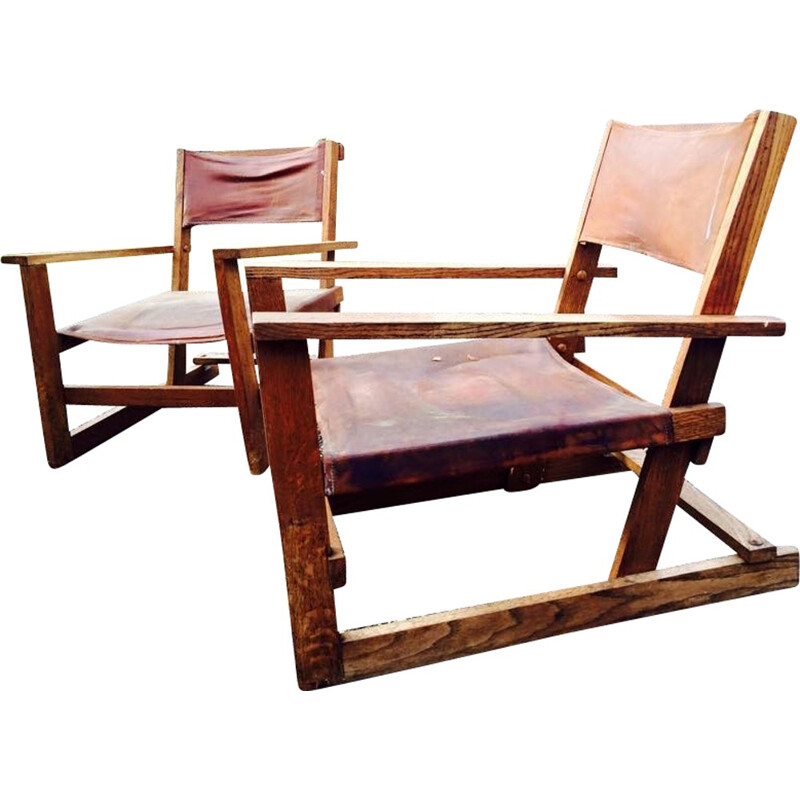 Paire de fauteuils scandinaves en bois et cuir - 1950