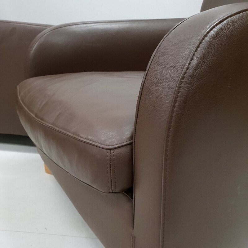 Pair of brown leather armchairs by Molinari