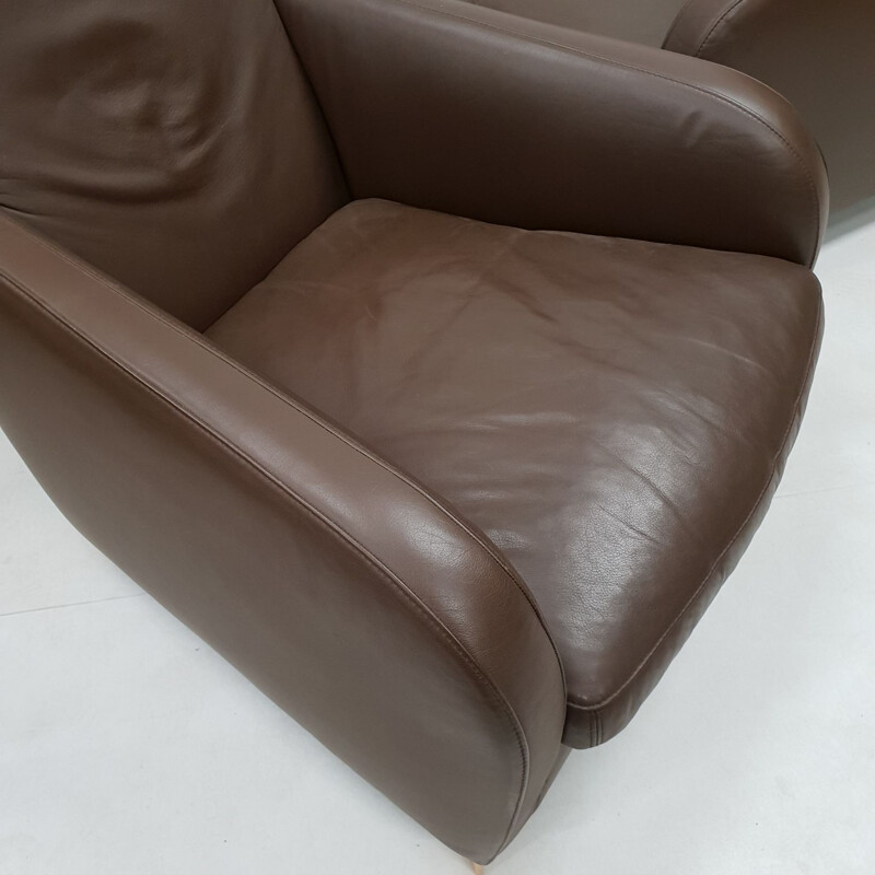 Pair of brown leather armchairs by Molinari