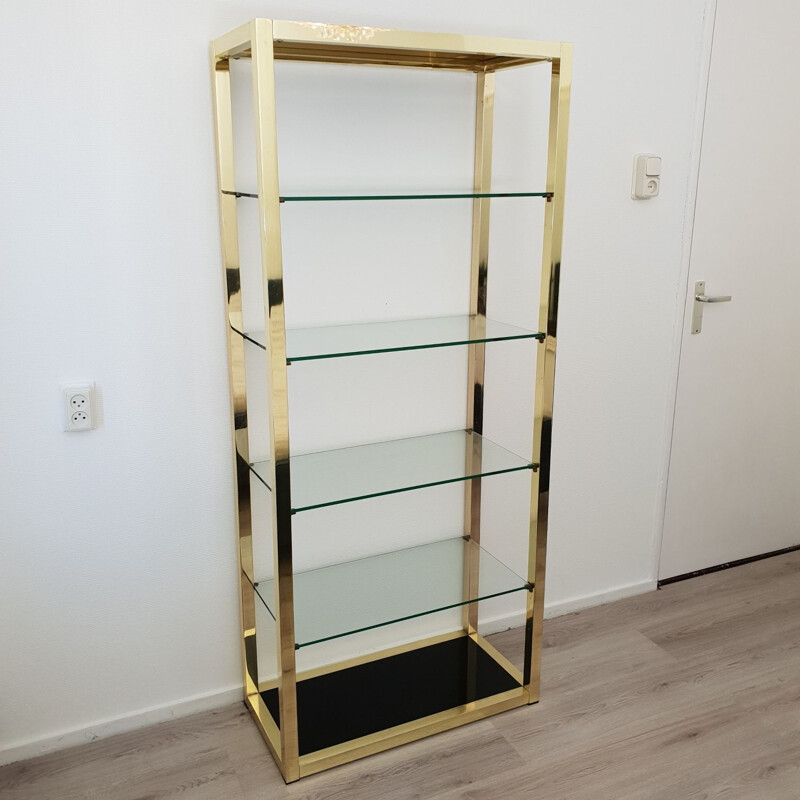 Vintage Italian gold plated shelving unit with clear and black glass