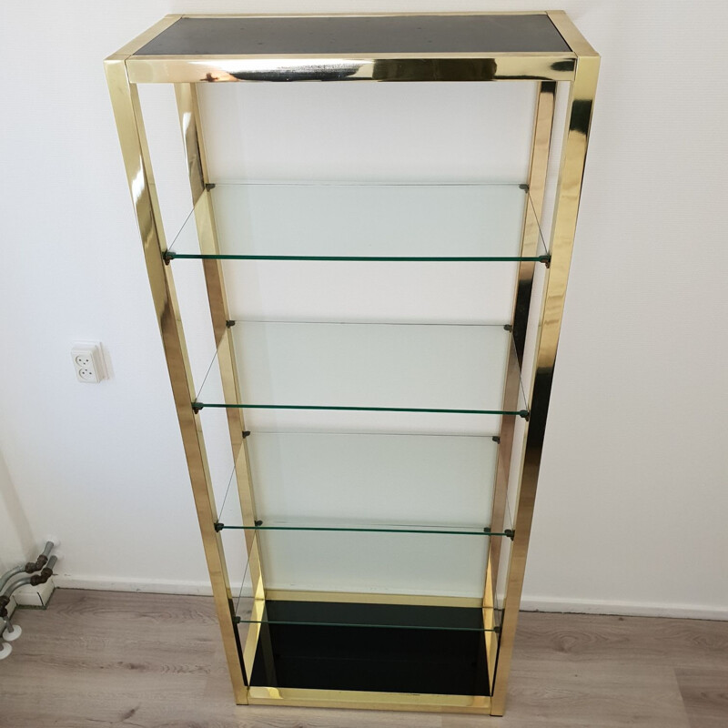 Vintage Italian gold plated shelving unit with clear and black glass