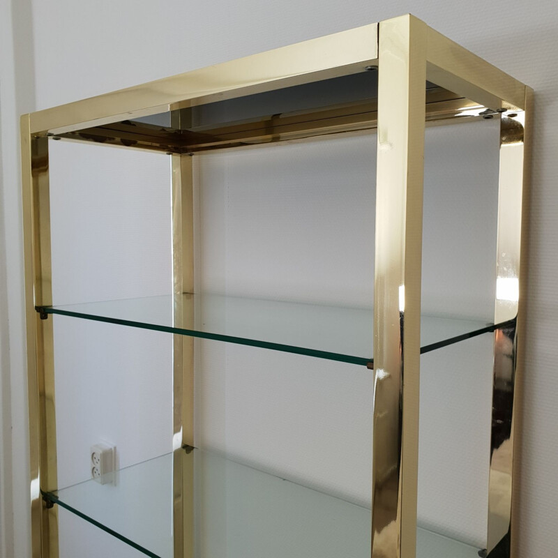 Vintage Italian gold plated shelving unit with clear and black glass