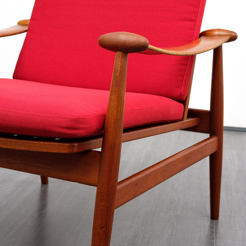 Red armchair by Finn Juhl for France & Son, model 133