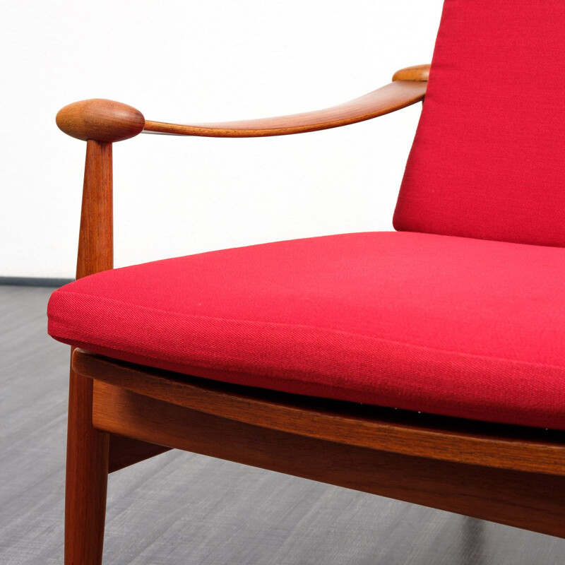 Red armchair by Finn Juhl for France & Son, model 133