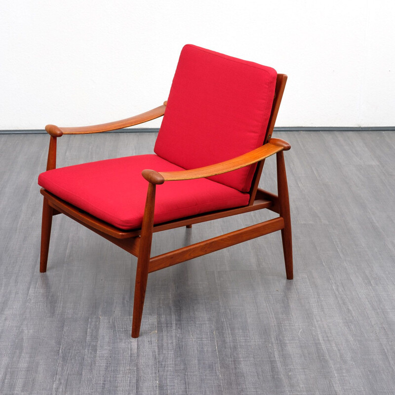 Red armchair by Finn Juhl for France & Son, model 133