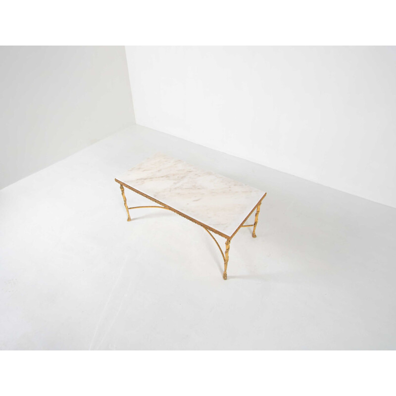 Gilded coffee table in marble by Maison Bagues