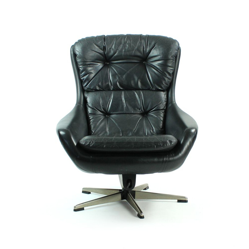 Swiveling armchair in black leather by Peem