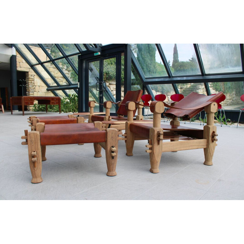 Pair of armchairs and ottomans in tawny leather laced 1960 s