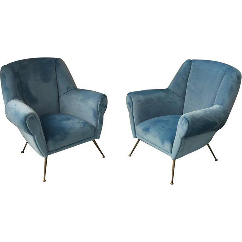 Paire de fauteuils en laiton et velours bleu