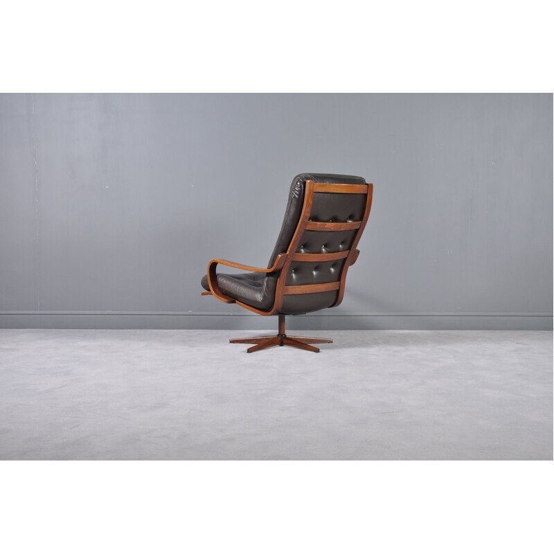 Vintage Swedish leather swivel armchair
