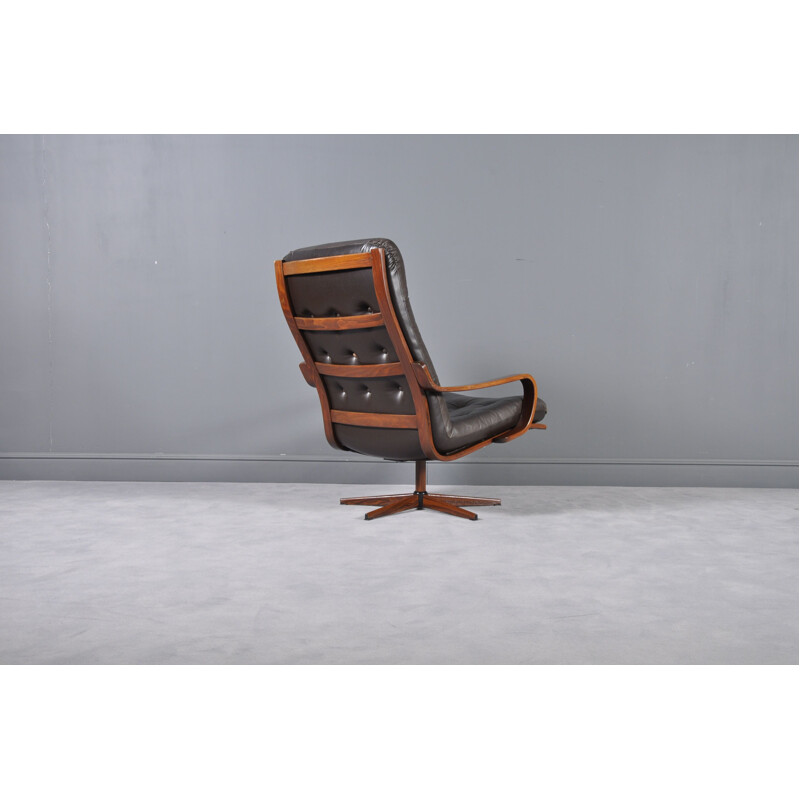 Vintage Swedish leather swivel armchair