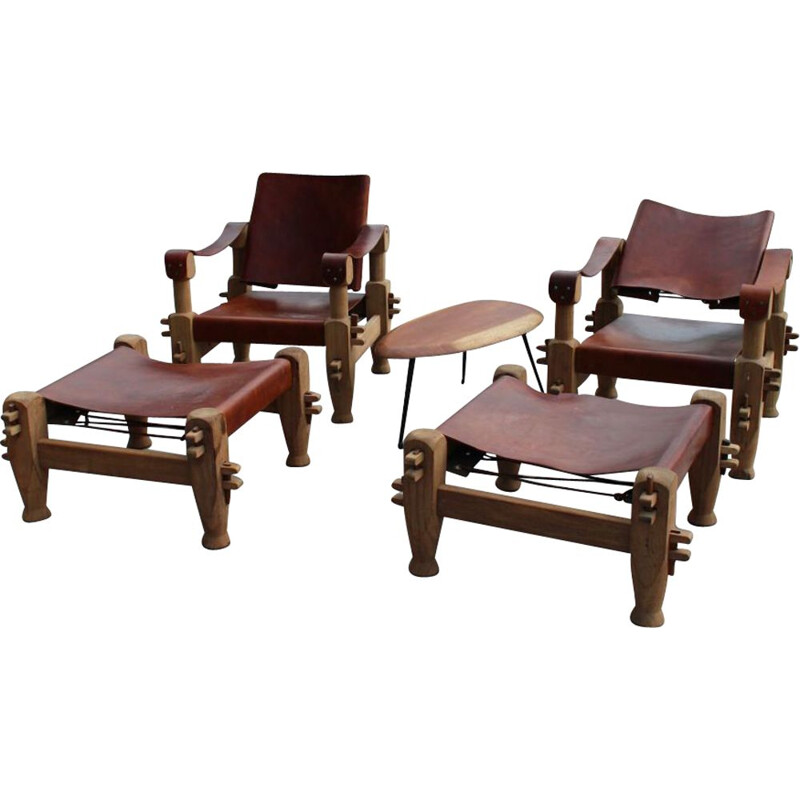 Pair of armchairs and ottomans in tawny leather laced 1960 s