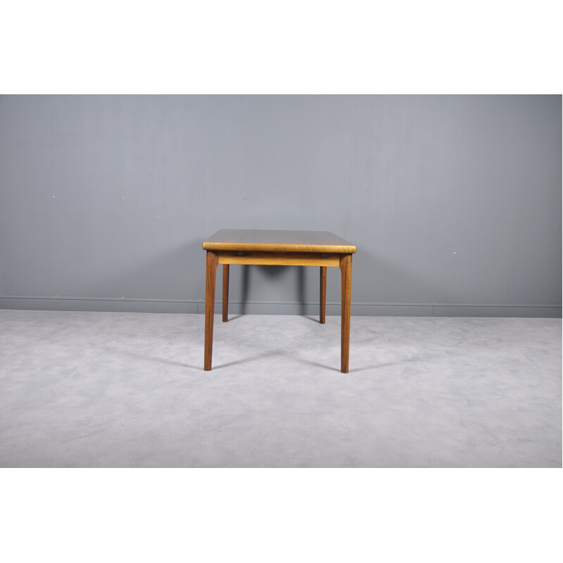 Extendable table in rosewood by Henning Kjærnulf