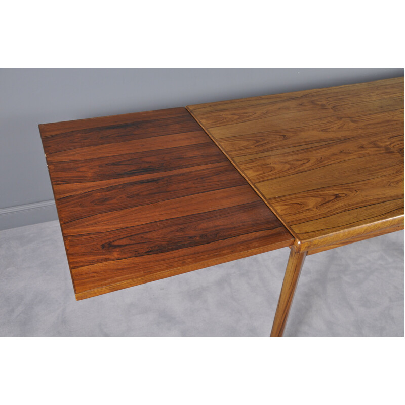 Extendable table in rosewood by Henning Kjærnulf