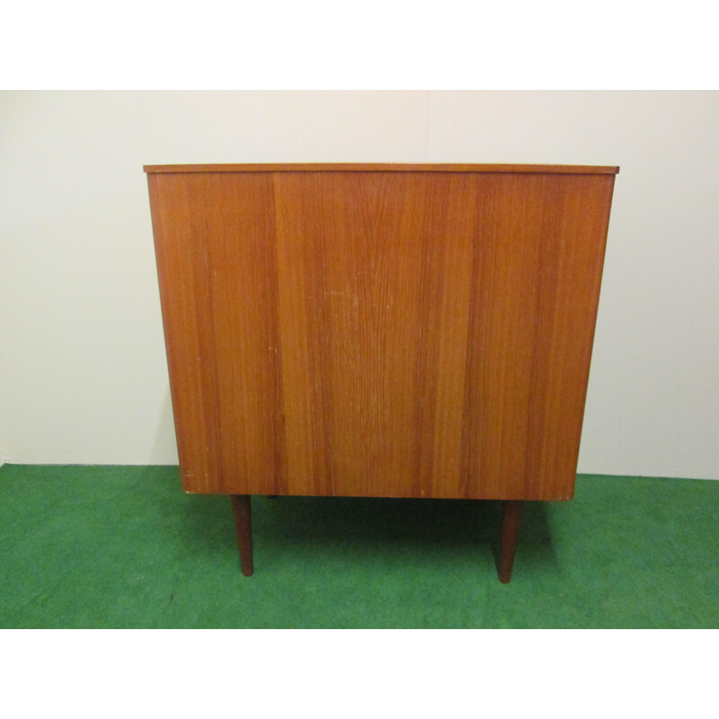 Commode vintage en teck 4 tiroirs sur pieds, anneaux laiton sur tiroirs,1960