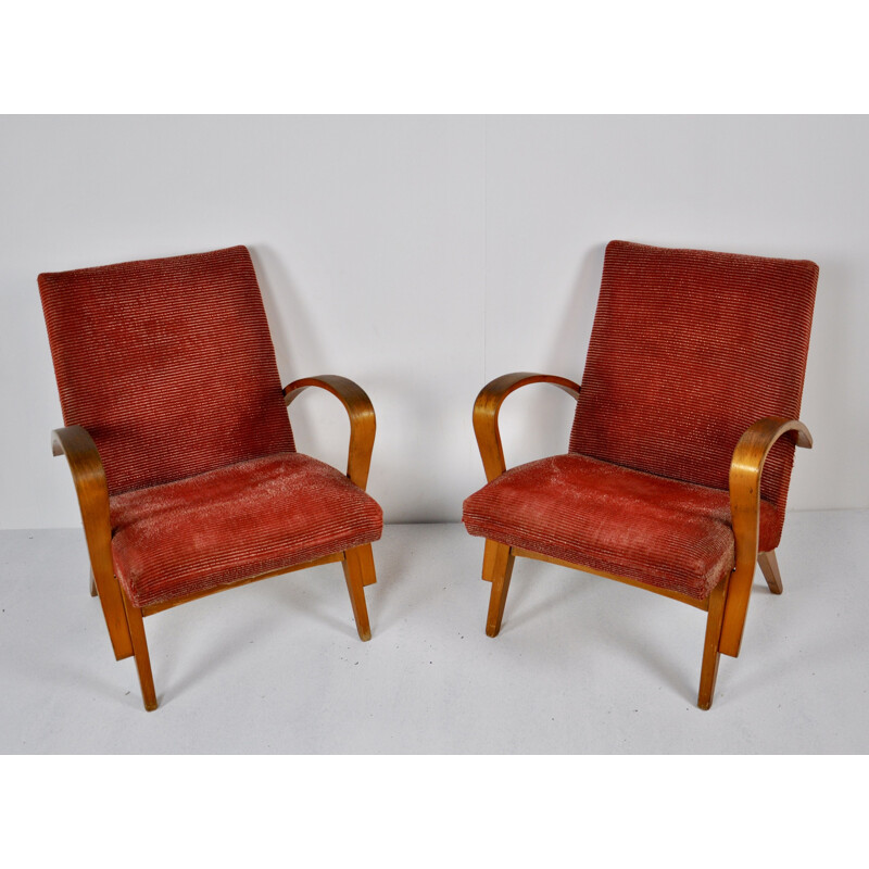 Pair of red wooden armchairs