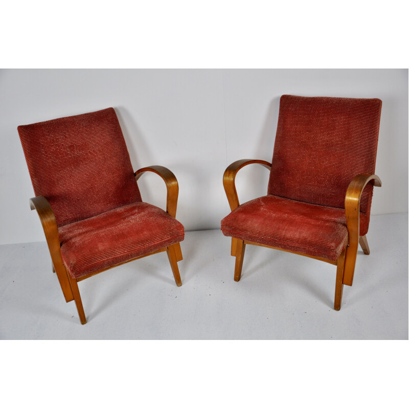 Pair of red wooden armchairs