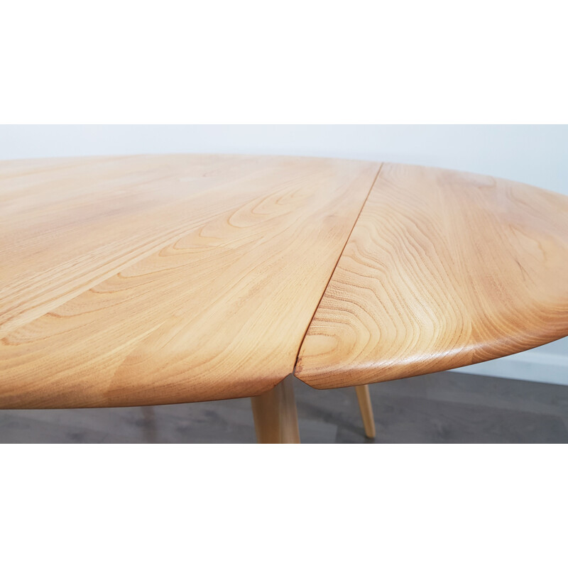 Vintage dining table in elm, Drop Leaf, Round by Lucian Ercolani for Ercol, 1960s.