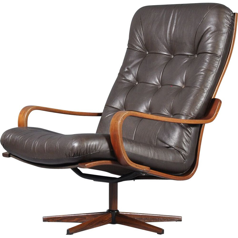 Fauteuil vintage pivotant en cuir suédois