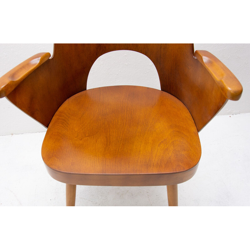 Fauteuil vintage par Oswald Haerdtl en bois contreplaqué 1960