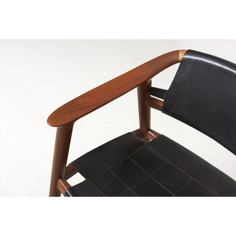 Bambi chair in black leather by Rastad & Relling