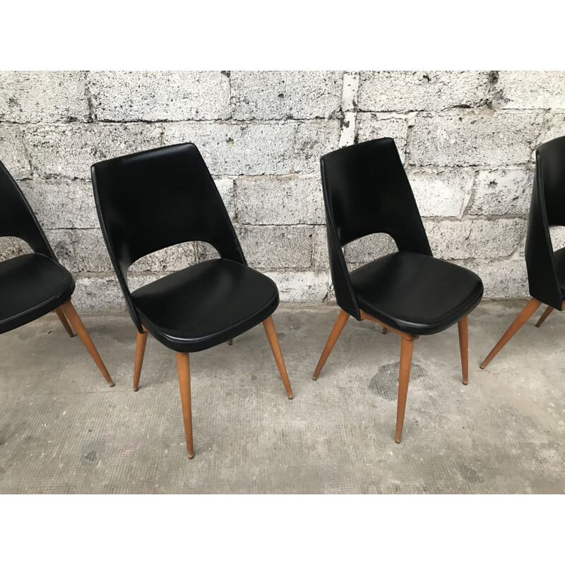 Set of 4 black Barrel chairs by Baumann