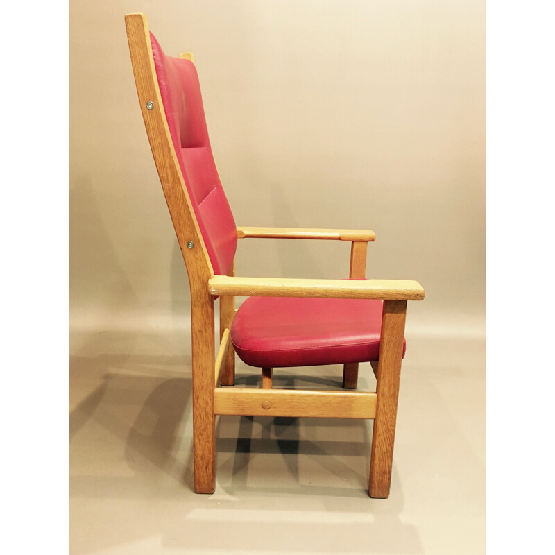 Pair of red armchairs in oak by Hans J. Wegner
