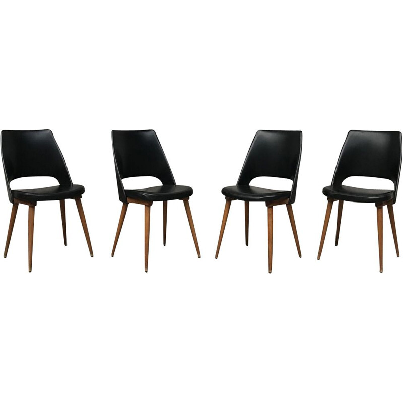 Set of 4 black Barrel chairs by Baumann