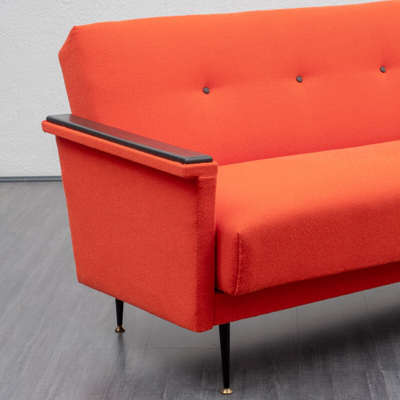 Vintage sofa in coral red, fold-out function, 1950s 