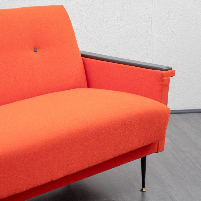 Vintage sofa in coral red, fold-out function, 1950s 