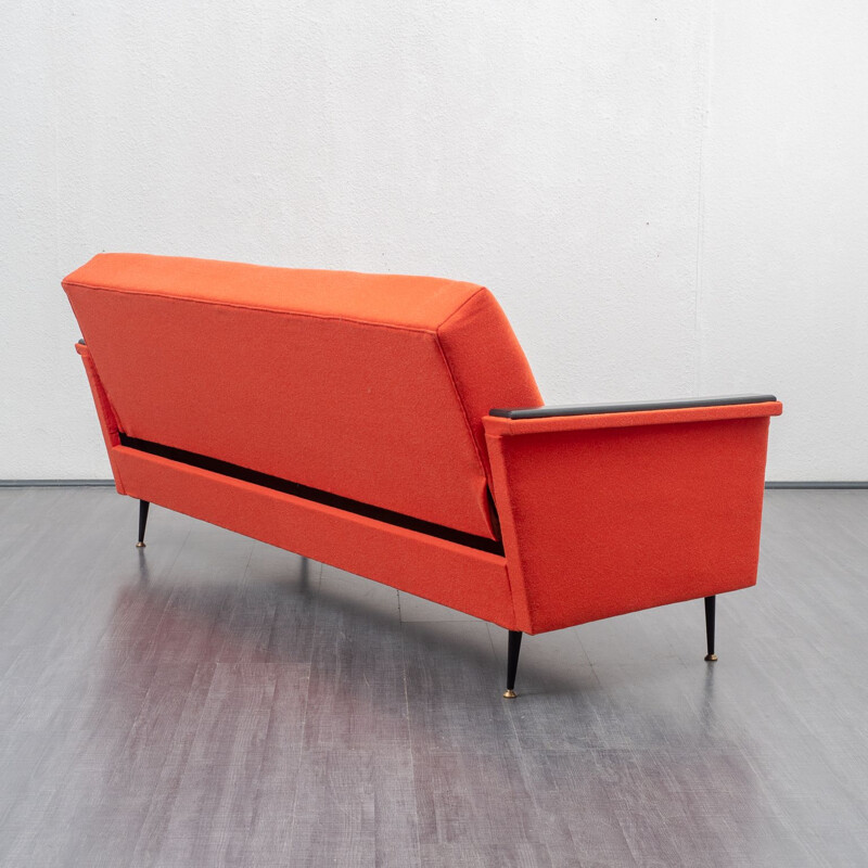 Vintage sofa in coral red, fold-out function, 1950s 