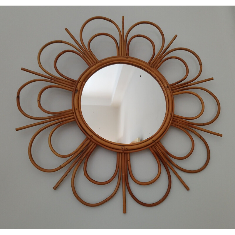 Vintage flower-shaped mirror in rattan