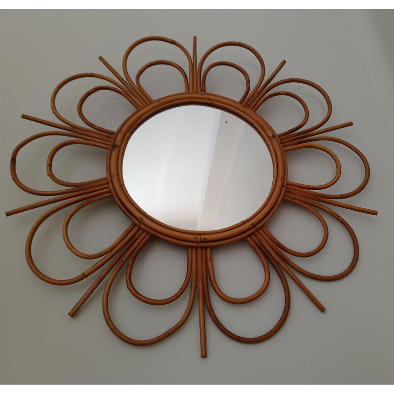 Vintage flower-shaped mirror in rattan