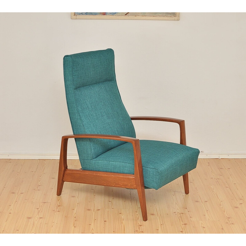 Green armchair in beechwood with folding footrest