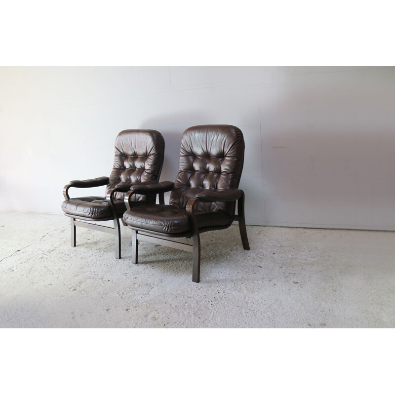 Pair of Danish armchairs in brown leather