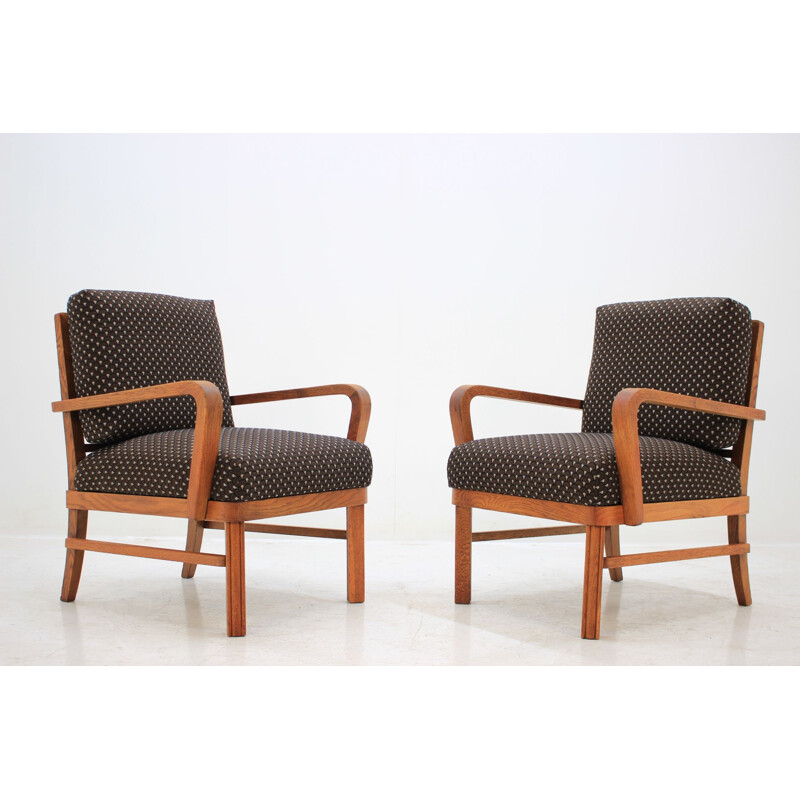 Paire de fauteuils marron en chêne